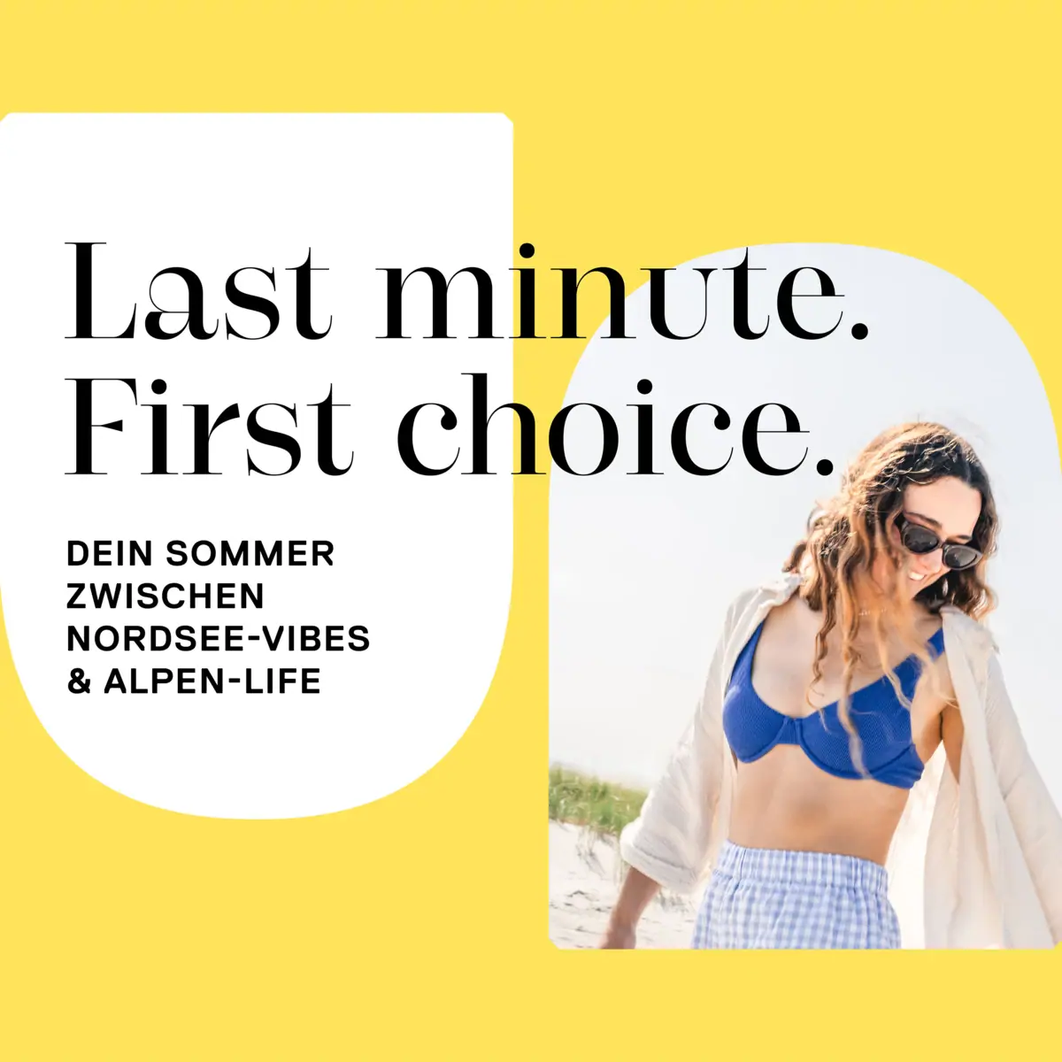 Eine Frau in einem Kleid und Sonnenbrille.
